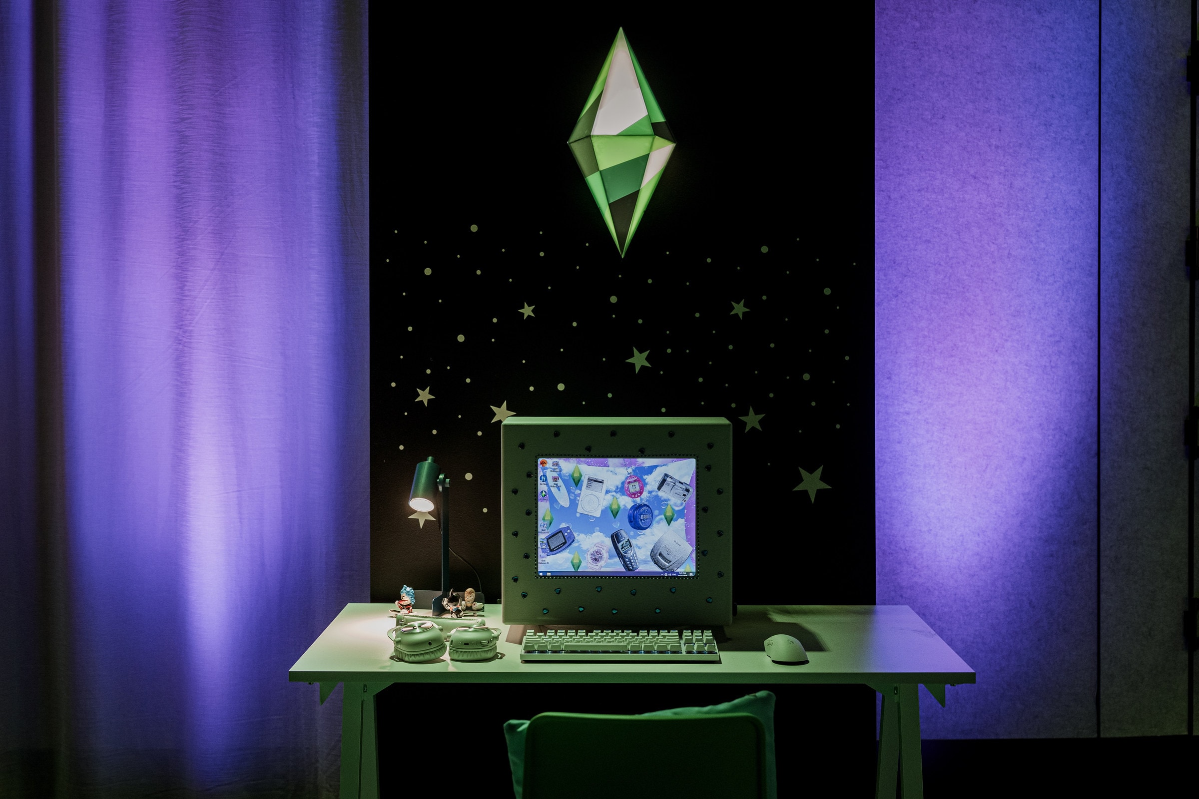 A retro gaming station under a glowing plumbob