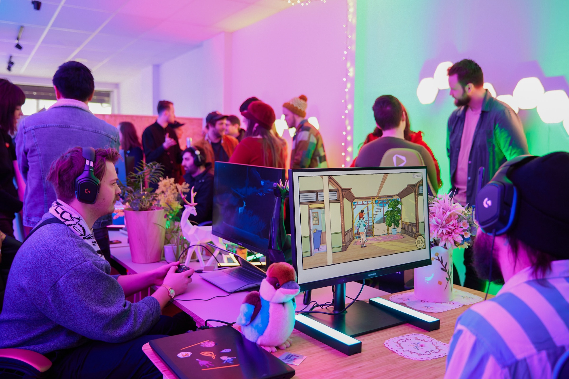 Developers and journalists playing games together at the VicScreen indie games famil